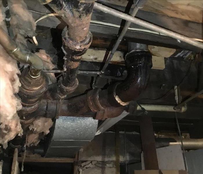basement old cast iron pipes leaking