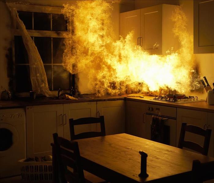 fire blazing on kitchen counter